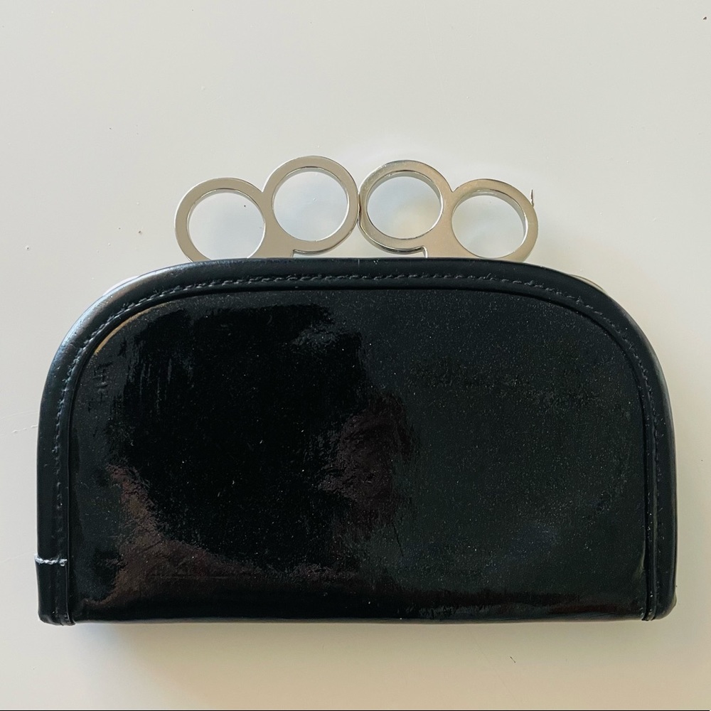 Brass knuckles coin wallet